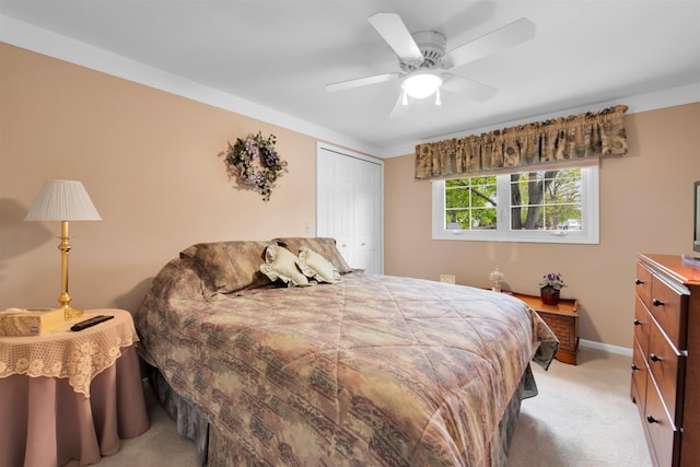 4112 Adams Dr, Shelby Twp, MI 48316 - bedroom featuring light colored carpet, a closet, and ceiling fan