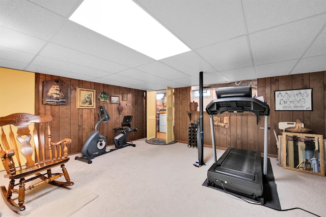 4112 Adams Dr, Shelby Twp, MI 48316 - exercise area featuring wooden walls, carpet floors, and a paneled ceiling