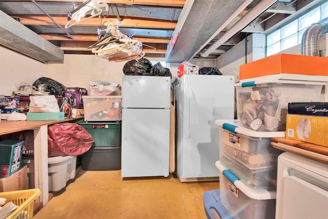 4112 Adams Dr, Shelby Twp, MI 48316 - below grade area with freestanding refrigerator and refrigerator