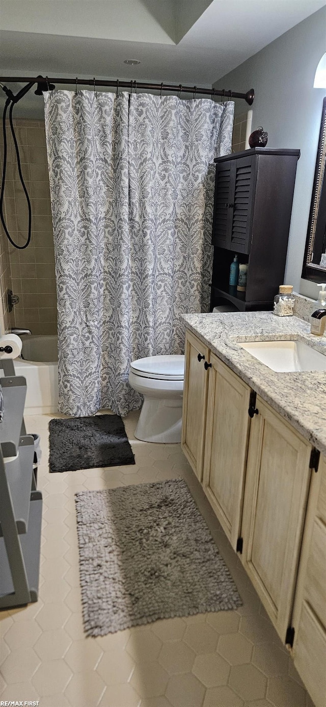 38544 Lanse Creuse St Unit 12, Harrison Twp, MI 48045 - full bathroom featuring vanity, shower / bath combo, and tile patterned floors