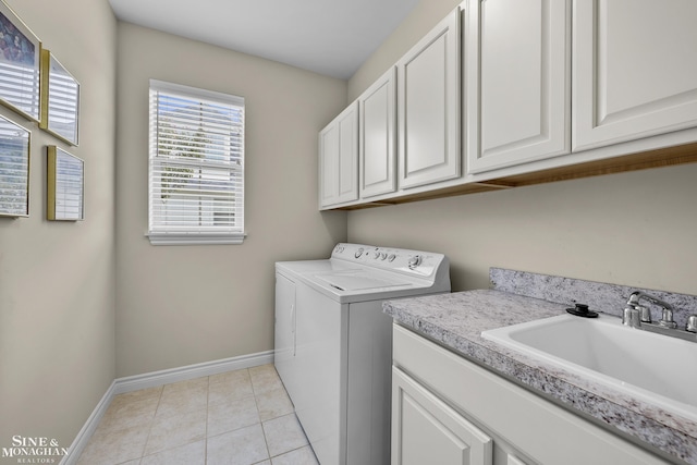 32 River Ln, Grosse Pointe Woods, MI 48236 - washroom with cabinet space, washer and clothes dryer, and light tile patterned floors
