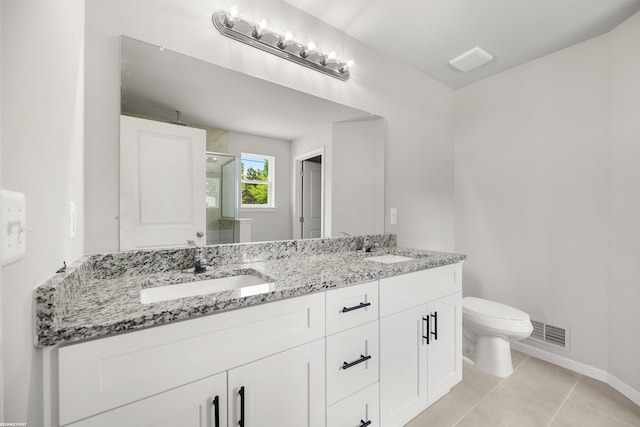 36217 Little Mack Ave, Clinton Township, MI 48035 - full bath with a stall shower, double vanity, and tile patterned flooring