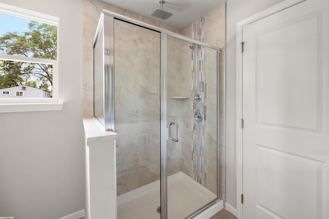 36217 Little Mack Ave, Clinton Township, MI 48035 - bathroom with a stall shower and baseboards