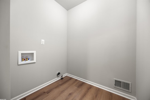 36217 Little Mack Ave, Clinton Township, MI 48035 - laundry area featuring washer hookup and wood finished floors