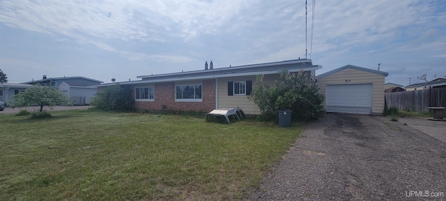 113 Albatross St, Gwinn, MI 49841 - view of property exterior featuring asphalt driveway and brick siding