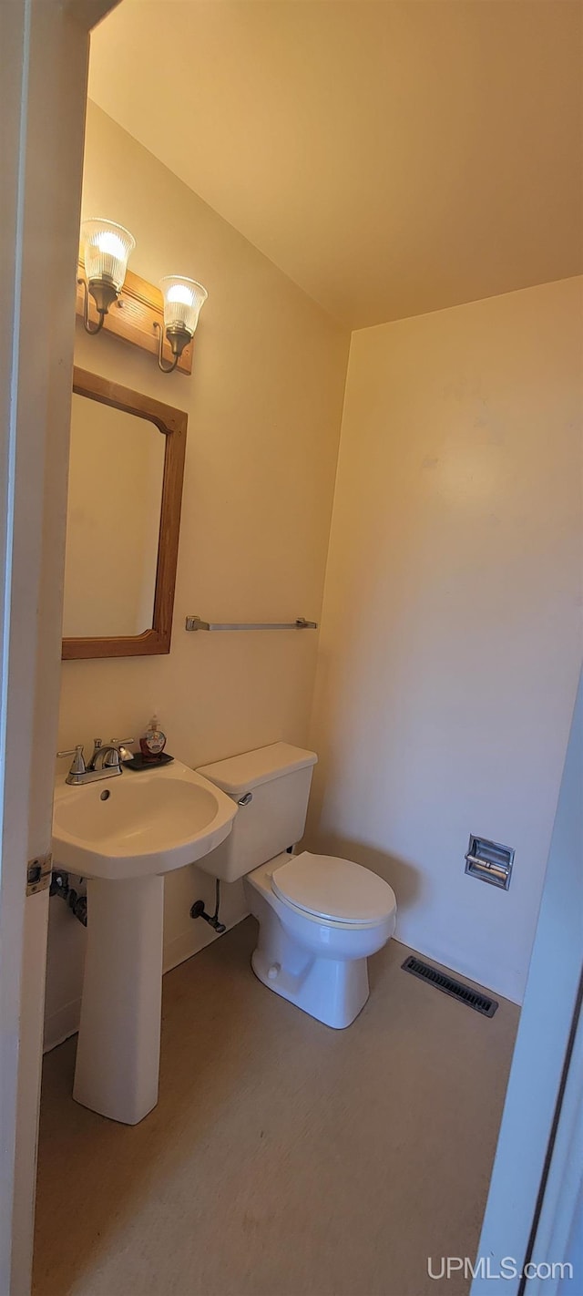 113 Albatross St, Gwinn, MI 49841 - bathroom featuring toilet and a sink