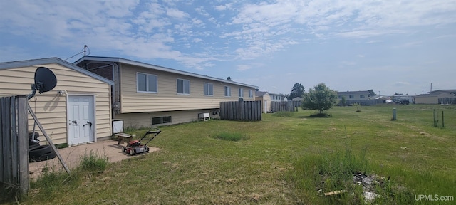 113 Albatross St, Gwinn, MI 49841 - back of house featuring a shed