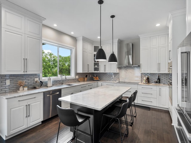 4661 Applewood Ct, Rochester, MI 48306 - kitchen with wall chimney range hood, stainless steel appliances, white cabinetry, decorative backsplash, and dark wood finished floors