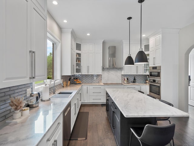 4661 Applewood Ct, Rochester, MI 48306 - kitchen featuring wall chimney exhaust hood, white cabinets, appliances with stainless steel finishes, decorative backsplash, and recessed lighting