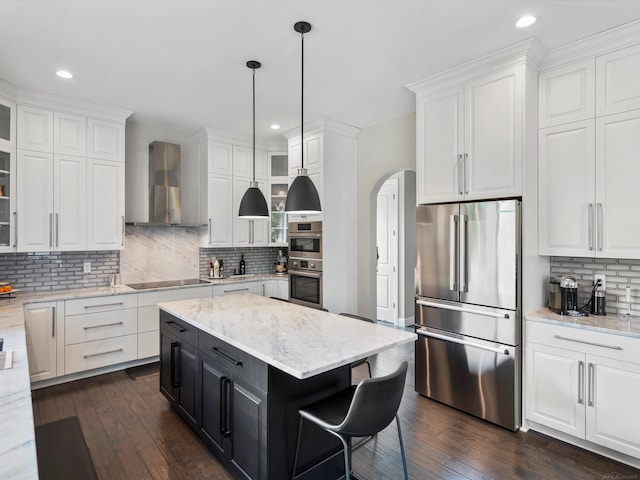 4661 Applewood Ct, Rochester, MI 48306 - kitchen featuring appliances with stainless steel finishes, wall chimney exhaust hood, white cabinetry, and recessed lighting