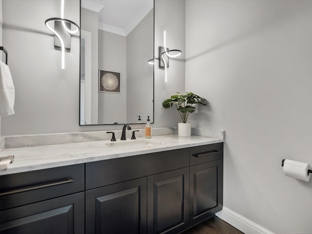 4661 Applewood Ct, Rochester, MI 48306 - bathroom featuring vanity, ornamental molding, and wood finished floors