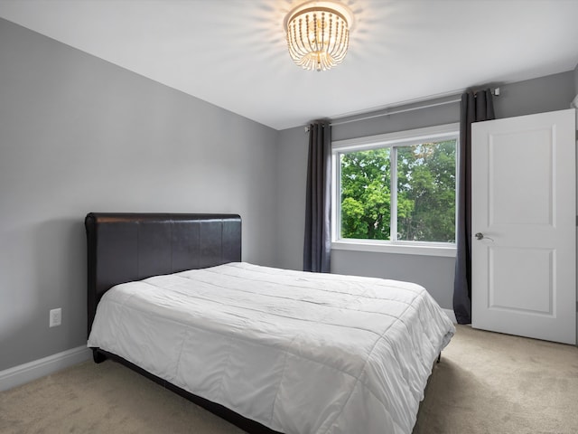 4661 Applewood Ct, Rochester, MI 48306 - bedroom featuring carpet and a chandelier