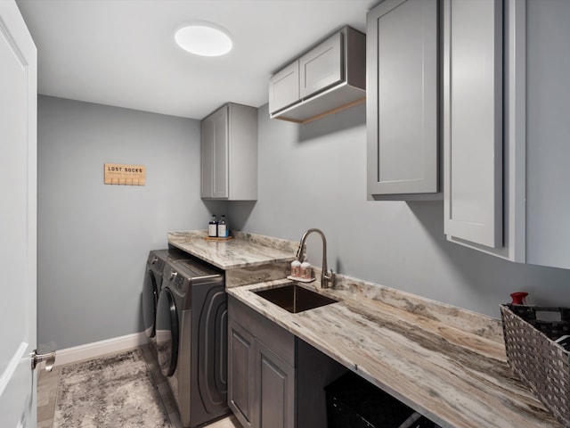 4661 Applewood Ct, Rochester, MI 48306 - laundry area featuring independent washer and dryer and cabinet space