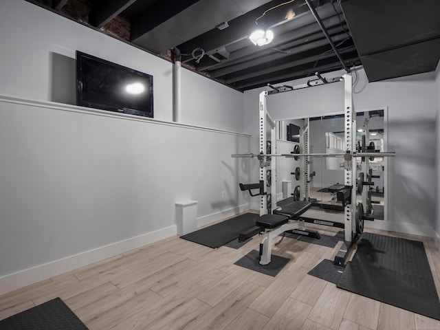 4661 Applewood Ct, Rochester, MI 48306 - workout area featuring wood finished floors and baseboards