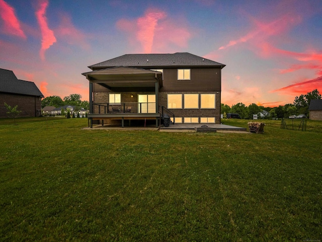 4661 Applewood Ct, Rochester, MI 48306 - rear view of property with a lawn, a wooden deck, and a patio