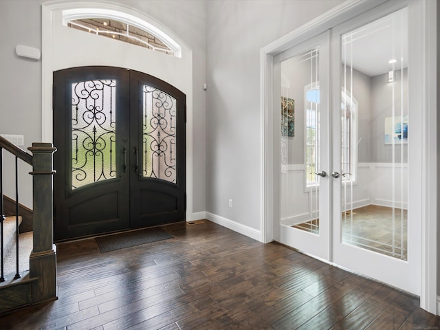4661 Applewood Ct, Rochester, MI 48306 - foyer entrance with french doors, dark wood-style flooring, and healthy amount of natural light