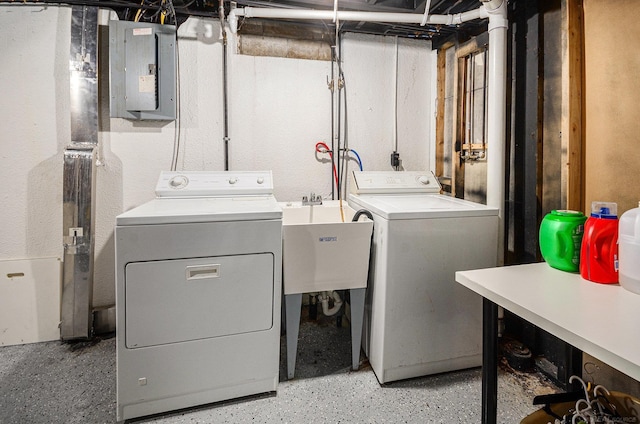 34147 Whittaker St, Clinton Township, MI 48035 - laundry room with electric panel and washer and dryer