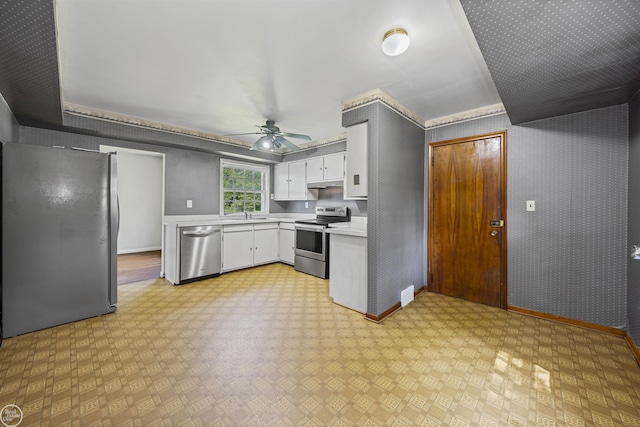 5541 Houghten Dr, Troy, MI 48098 - kitchen with stainless steel appliances, light countertops, light floors, under cabinet range hood, and ceiling fan