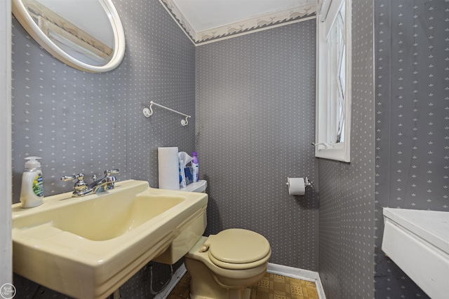 5541 Houghten Dr, Troy, MI 48098 - bathroom featuring a sink and wallpapered walls