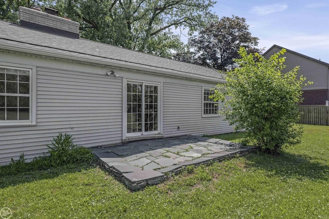 5541 Houghten Dr, Troy, MI 48098 - rear view of property featuring a patio, a chimney, and roof with shingles