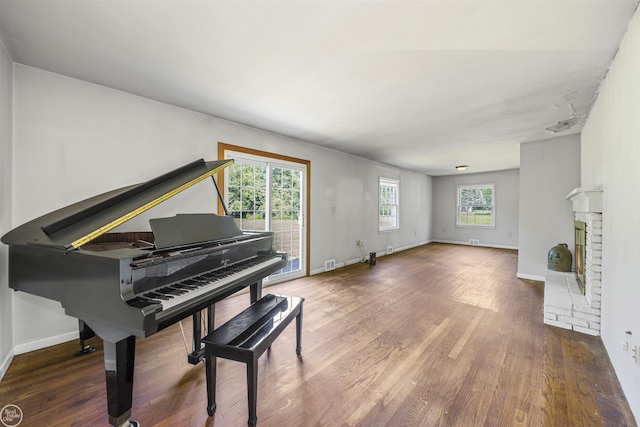 5541 Houghten Dr, Troy, MI 48098 - living area featuring wood finished floors and a fireplace