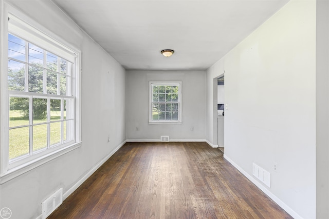 5541 Houghten Dr, Troy, MI 48098 - spare room featuring dark wood-style flooring and baseboards