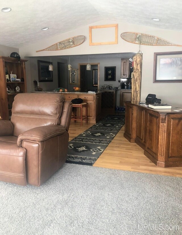 790 N Horseshoe Lake Dr, Gwinn, MI 49841 - living area with light wood-style floors, vaulted ceiling, and recessed lighting