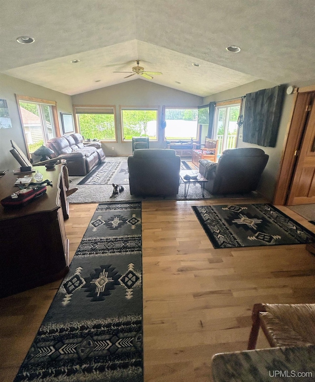 790 N Horseshoe Lake Dr, Gwinn, MI 49841 - living area featuring vaulted ceiling, wood finished floors, ceiling fan, and recessed lighting