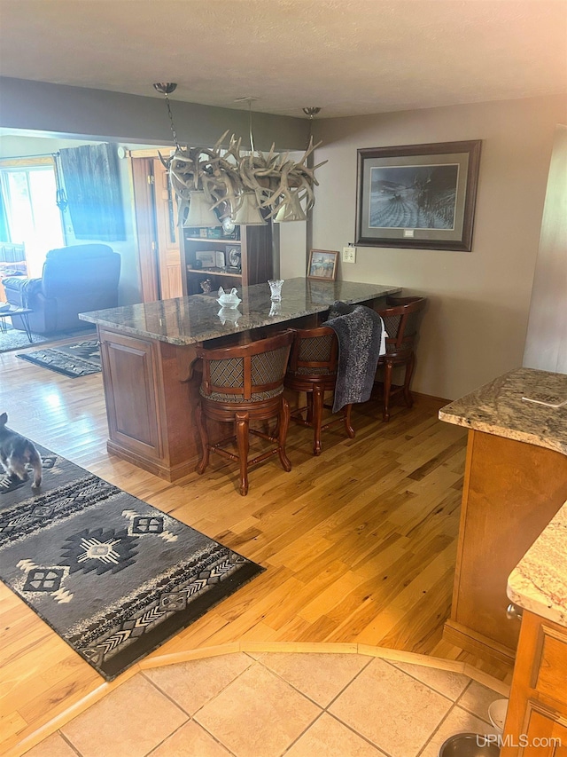 790 N Horseshoe Lake Dr, Gwinn, MI 49841 - dining area featuring light wood finished floors