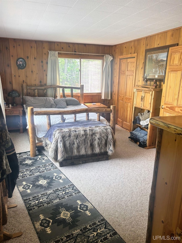 790 N Horseshoe Lake Dr, Gwinn, MI 49841 - bedroom featuring carpet floors and wood walls
