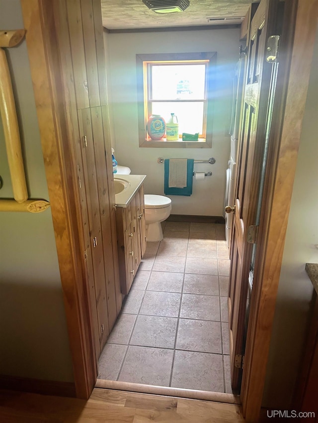 790 N Horseshoe Lake Dr, Gwinn, MI 49841 - bathroom with toilet and vanity