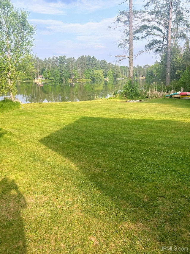 790 N Horseshoe Lake Dr, Gwinn, MI 49841 - view of green lawn featuring a water view