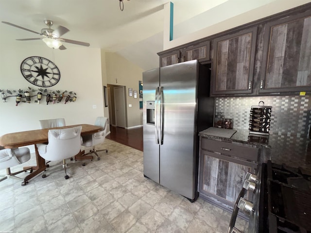 51767 Huntley Ave, New Baltimore, MI 48047 - kitchen with stainless steel fridge with ice dispenser, dark brown cabinetry, vaulted ceiling, backsplash, and a ceiling fan