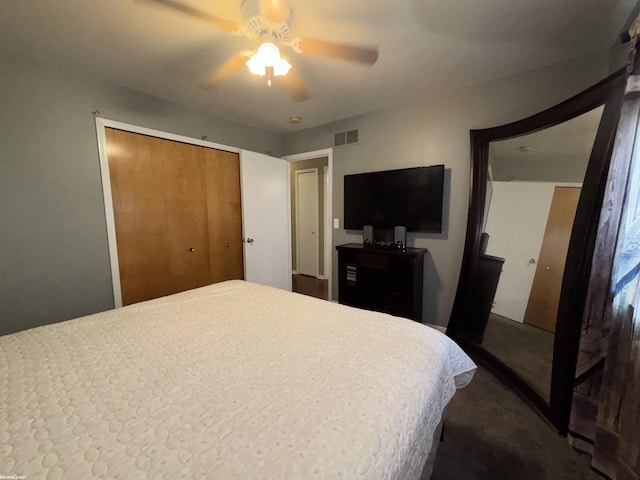 51767 Huntley Ave, New Baltimore, MI 48047 - bedroom featuring ceiling fan, dark carpet, and a closet