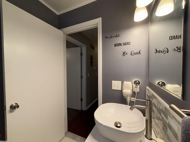 51767 Huntley Ave, New Baltimore, MI 48047 - bathroom with crown molding and tile patterned flooring