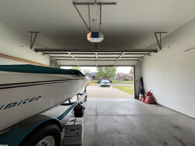 51767 Huntley Ave, New Baltimore, MI 48047 - garage featuring a garage door opener