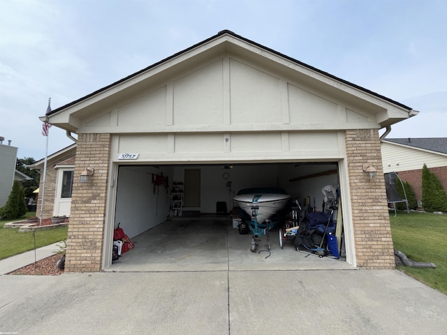 51767 Huntley Ave, New Baltimore, MI 48047 - garage featuring concrete driveway
