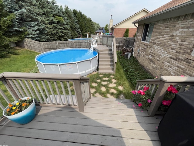 51767 Huntley Ave, New Baltimore, MI 48047 - wooden deck featuring a fenced backyard and stairway