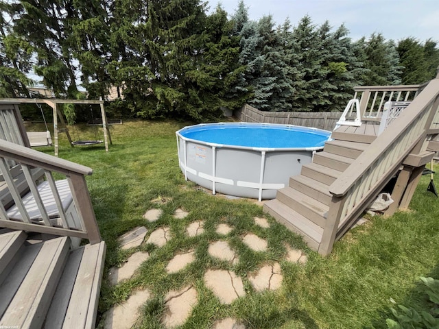 51767 Huntley Ave, New Baltimore, MI 48047 - view of pool featuring stairway and a wooden deck