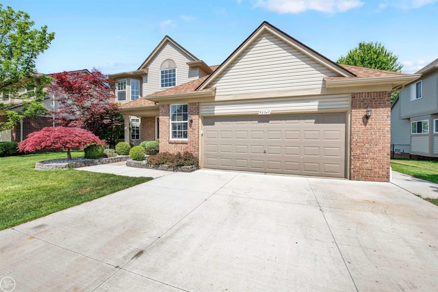 52047 Sycamore Dr, Chesterfield, MI 48047 - traditional home featuring brick siding, driveway, a front lawn, a garage, and a shingled roof