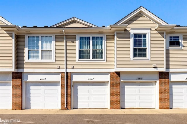 45592 Warwick Dr, Macomb Twp, MI 48044 - multi unit property featuring brick siding