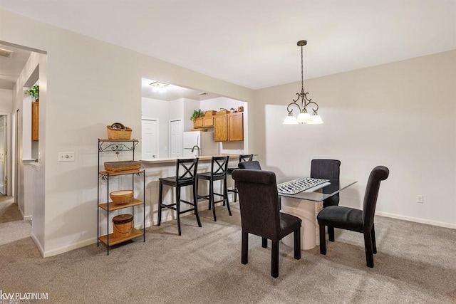45592 Warwick Dr, Macomb Twp, MI 48044 - dining area featuring light colored carpet and baseboards