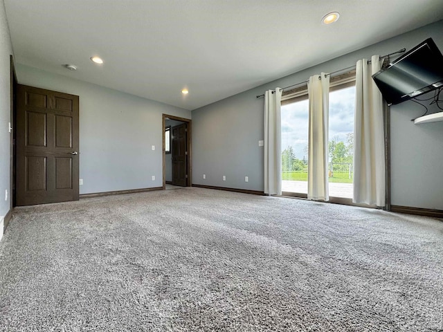 1084 15.5 Rd, Bark River, MI 49807 - unfurnished bedroom with carpet floors, access to exterior, and recessed lighting