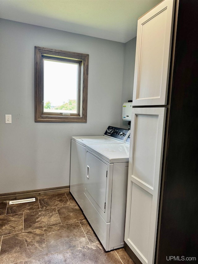 1084 15.5 Rd, Bark River, MI 49807 - washroom with washer and dryer and baseboards