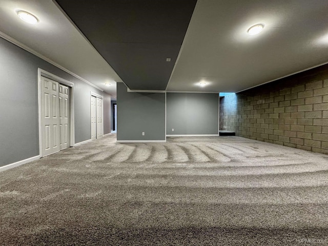 1084 15.5 Rd, Bark River, MI 49807 - finished below grade area featuring ornamental molding and carpet flooring