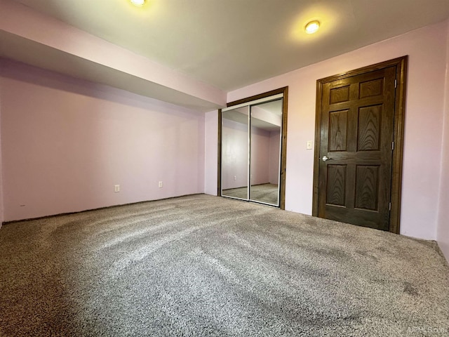 1084 15.5 Rd, Bark River, MI 49807 - unfurnished bedroom featuring carpet and a closet