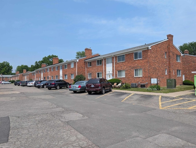 29356 Hoover Rd, Warren, MI 48093 - view of building exterior featuring uncovered parking