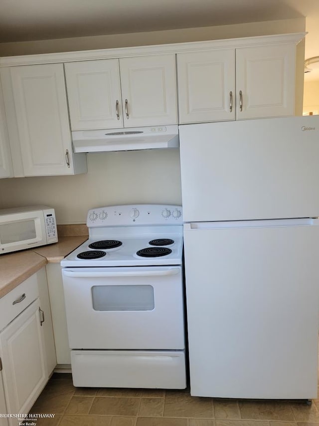 29356 Hoover Rd, Warren, MI 48093 - kitchen with white appliances, under cabinet range hood, and white cabinets