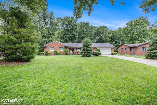 3480 Devonshire St, Sterling Heights, MI 48310 - ranch-style house with concrete driveway, a garage, a front lawn, and brick siding