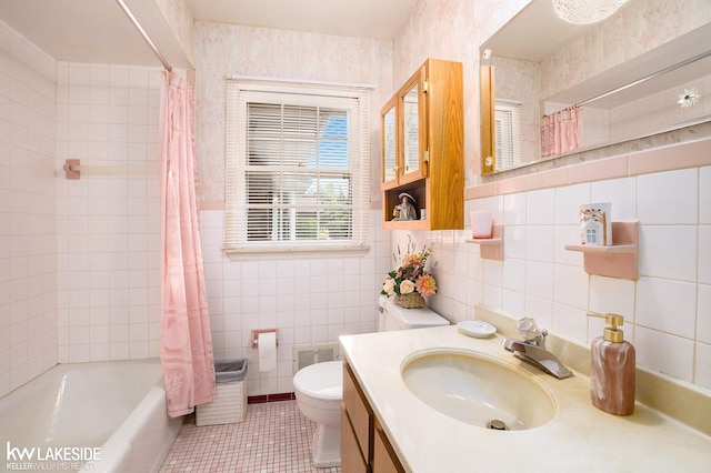 3480 Devonshire St, Sterling Heights, MI 48310 - bathroom with tile walls, tile patterned flooring, shower / bath combination with curtain, and vanity